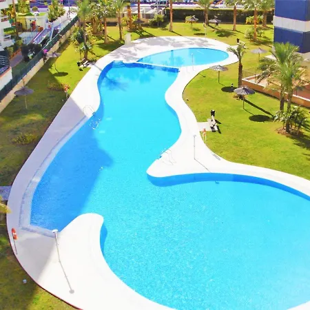 Seaside Oasis: Beachfront With Pool Apartment